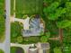 Aerial view of an estate home with a long driveway and meticulously landscaped grounds at 3500 Maple Wood Dr, Denver, NC 28037