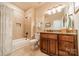 Cozy bathroom featuring a shower-tub combination and a single sink vanity with granite counters at 3500 Maple Wood Dr, Denver, NC 28037