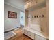 Well-organized entryway with built-in bench, storage drawers, and coat hooks at 3500 Maple Wood Dr, Denver, NC 28037