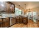 Kitchen featuring granite countertops, stainless appliances and view to the breakfast area at 3500 Maple Wood Dr, Denver, NC 28037