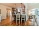 Open-concept kitchen with eat-in bar, breakfast area, and view to an adjacent room at 3500 Maple Wood Dr, Denver, NC 28037