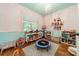 Playful room with colorful décor, hardwood floors, and ample play space at 3500 Maple Wood Dr, Denver, NC 28037