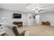 Cozy basement with a TV, comfortable seating, and ample space for relaxation at 402 Swaim Ct, Salisbury, NC 28147