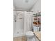 Clean bathroom with a walk-in shower, convenient shelving, and ample space at 402 Swaim Ct, Salisbury, NC 28147