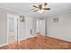 Spacious bedroom featuring hardwood floors, multiple closets, and access to the bathroom at 402 Swaim Ct, Salisbury, NC 28147