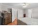Bedroom with hardwood floors, dresser, and white door at 402 Swaim Ct, Salisbury, NC 28147