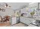 Open kitchen with granite counters, stainless steel appliances, and a breakfast area at 402 Swaim Ct, Salisbury, NC 28147
