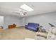 Cozy living room features carpet flooring, fan, and neutral paint, creating a relaxing atmosphere at 402 Swaim Ct, Salisbury, NC 28147