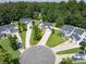 Aerial view of a neighborhood featuring well-maintained homes, green lawns, and mature trees at 4113 Edgeview Dr, Indian Trail, NC 28079
