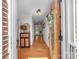 Entryway featuring hardwood floors, a cabinet, and a decorative front door at 4113 Edgeview Dr, Indian Trail, NC 28079