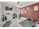 Home gym with carpet, treadmill, weights, and a large ceiling fan at 4113 Edgeview Dr, Indian Trail, NC 28079