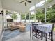 Covered porch featuring a dining table, a sofa, and view of the surrounding landscape at 4113 Edgeview Dr, Indian Trail, NC 28079