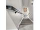 Carpeted staircase with dark wood handrail and light gray walls at 4113 Edgeview Dr, Indian Trail, NC 28079