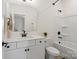 Bright bathroom features a shower/tub combo with a white cabinet vanity and black hardware at 433 Sinaloa St, Waxhaw, NC 28173