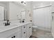 Bright bathroom featuring a double vanity, modern fixtures, and clean lines, offering a functional and elegant space at 433 Sinaloa St, Waxhaw, NC 28173