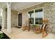 Inviting front porch with comfortable rocking chairs, offering a cozy outdoor spot at 433 Sinaloa St, Waxhaw, NC 28173
