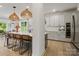 Spacious eat-in kitchen with a large island, pendant lighting, breakfast bar and stainless appliances at 433 Sinaloa St, Waxhaw, NC 28173