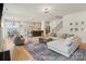 Spacious living room with an open floor plan connecting the kitchen, dining area, and staircase at 433 Sinaloa St, Waxhaw, NC 28173
