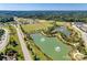 Aerial shot showcasing neighborhood ponds, walking trails, athletic fields, and lush greenery at 4500 Carrington Dr, Lancaster, SC 29720