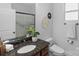 Modern bathroom featuring a granite countertop vanity and glass-enclosed shower at 4500 Carrington Dr, Lancaster, SC 29720