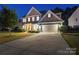Spacious two-car garage with large concrete driveway and inviting curb appeal at 4500 Carrington Dr, Lancaster, SC 29720
