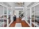 Elegant foyer with hardwood floors and a view of the upper level at 4500 Carrington Dr, Lancaster, SC 29720