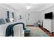 Relaxing main bedroom with plush carpet, tray ceiling, and a sitting area near the window at 4500 Carrington Dr, Lancaster, SC 29720