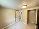 Bedroom with a door to another room and closet at 502 E Main St, Cleveland, NC 27013