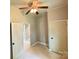 Cozy bedroom featuring fresh paint, new flooring, and closet at 502 E Main St, Cleveland, NC 27013