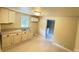 Kitchen with double sinks and shaker style cabinets at 502 E Main St, Cleveland, NC 27013