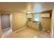 Kitchen featuring double sinks and shaker style cabinets at 502 E Main St, Cleveland, NC 27013