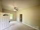 Spacious living room featuring ample natural light, fresh paint, and new flooring at 502 E Main St, Cleveland, NC 27013
