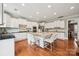 Well-equipped kitchen features a large island, modern appliances, and ample counter space at 5046 Cressingham Dr, Fort Mill, SC 29707