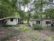 Rustic home exterior with two small cabins nestled within a wooded area at 509 Waring Ct # Lot 4, Fort Mill, SC 29707