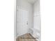 Mudroom-style entryway with hooks, bench, and cubbies for storage next to the front door at 5142 Tommy Ln # 1202, Stanley, NC 28164