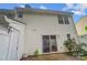 Back of house showing sliding glass door, storage closet, and small garden at 5237 Ficus Tree Ln, Charlotte, NC 28215