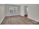 Spacious bedroom with ample natural light and luxury vinyl flooring at 5237 Ficus Tree Ln, Charlotte, NC 28215