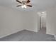 Neutral bedroom featuring carpet, ceiling fan, and closet at 5237 Ficus Tree Ln, Charlotte, NC 28215