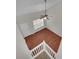 Top-down view of open area with wood flooring, stairs, and bright window at 5237 Ficus Tree Ln, Charlotte, NC 28215