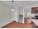 Dining room with open access to stairway and view of the living room at 5237 Ficus Tree Ln, Charlotte, NC 28215