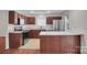 Updated kitchen with modern appliances, island, and lots of cabinets at 5237 Ficus Tree Ln, Charlotte, NC 28215