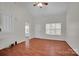 Open-concept room with vaulted ceiling and wood-look flooring at 5237 Ficus Tree Ln, Charlotte, NC 28215