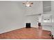 Spacious living room features hardwood flooring and a cozy fireplace at 5237 Ficus Tree Ln, Charlotte, NC 28215