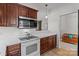 Modern kitchen featuring stainless steel microwave and white oven range at 5305 Waverly Lynn Ln # 4A, Charlotte, NC 28269