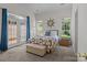 Bright main bedroom with multiple windows and a walk-out to the backyard at 5305 Waverly Lynn Ln # 4A, Charlotte, NC 28269