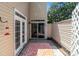 Outdoor patio featuring double doors, sliding glass doors, and a privacy fence is ideal for relaxation and entertaining at 5305 Waverly Lynn Ln # 4A, Charlotte, NC 28269