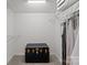 Walk-in closet with ample shelving, storage space and clothes hanging in a well-lit room at 5305 Waverly Lynn Ln # 4A, Charlotte, NC 28269