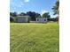Expansive backyard featuring two sheds, offering ample outdoor storage and hobby space at 5420 Harkey Rd, Waxhaw, NC 28173