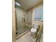 Bathroom with glass shower and updated toilet at 5420 Harkey Rd, Waxhaw, NC 28173