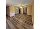 Spacious living room with a ceiling fan, stylish curtains, and modern flooring at 5420 Harkey Rd, Waxhaw, NC 28173